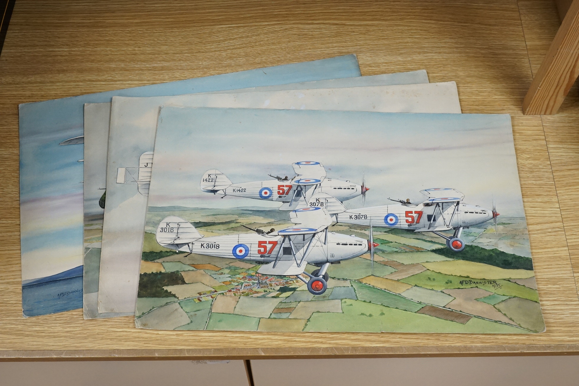 A F D Bannister, set of four original watercolours for postcard designs, 1930's RAF aircraft to include Hawker Hart fighters, Fairey Hendon Bomber and Super Marine Scapa Flying Boat, two signed and dated 1935, 30 x 46cm,